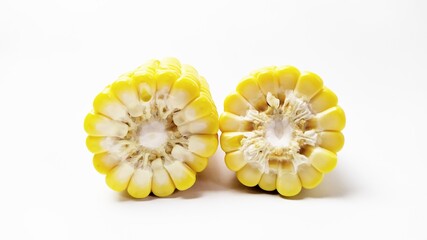 Close up fresh yellow sweet corn isolated on white background