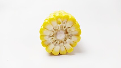 Close up fresh yellow sweet corn isolated on white background
