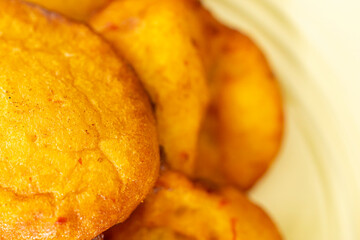 Nigerian Deep Fried Beancake - Akara ready to eat on Yellow Plate