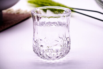 A glass of water in a white background. Healthy drinking water in clear glass.