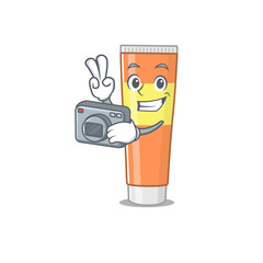 a proficient photographer toothpaste cartoon design concept working with camera