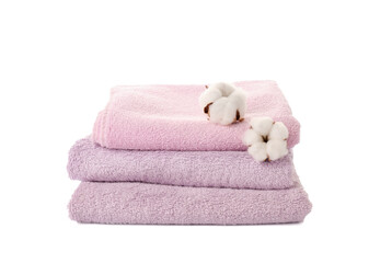 Fototapeta na wymiar Cotton flowers and soft towels on white background
