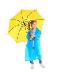 Cute little girl with umbrella on white background