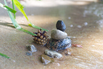 Small stack of pebbles or stones in a stream