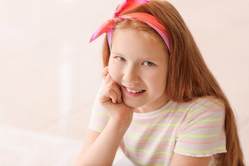 Cute redhead girl at home