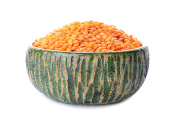Bowl with red lentils on white background