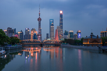 Night view of Waibaidu Bridge and Lujiazui, the skyline and landmark in Shanghai, China, with...