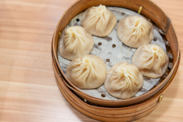 Shanghai Meat juicy dumplings, traditional snack in Shanghai, steamed dumplings with meat and soup inside.