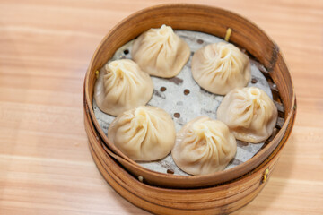 Shanghai Meat juicy dumplings, traditional snack in Shanghai, steamed dumplings with meat and soup inside.