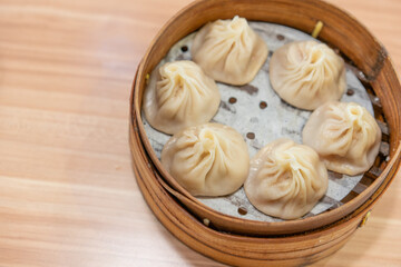 Shanghai Meat juicy dumplings, traditional snack in Shanghai, steamed dumplings with meat and soup inside.