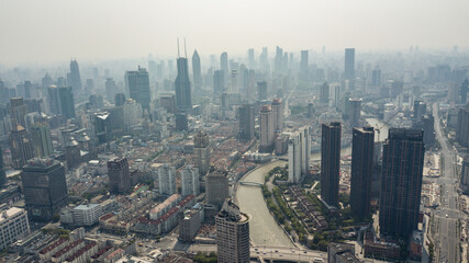 Fototapeta na wymiar The skyline of skyscrapers along the Suzhou River, in Shanghai, China.