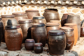 different sizes of ancient clay pots