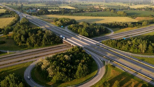 Aerial view of road interchange or highway intersection with traffic on the road. A7 E45 Autobahnkreuz Rendsburg