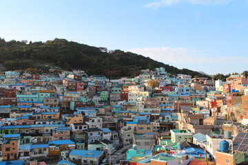 Gamcheon Culture Village which is houses built in staircase-fashion on the foothills of a coastal mountain during sunset in autumn, Busan, South Korea