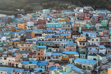 Gamcheon Culture Village which is houses built in staircase-fashion on the foothills of a coastal mountain during sunset in autumn, Busan, South Korea
