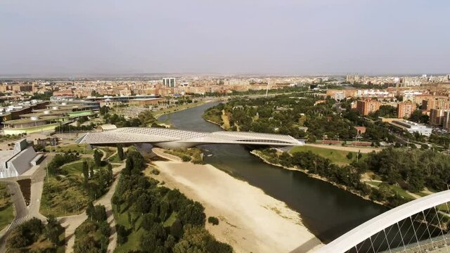 Aerial view of modern bridge in Zaragoza. Aragon,Spain. Drone Footage