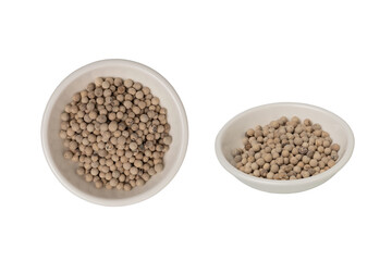 Bowl of Peppercorns (white pepper) isolated on white background