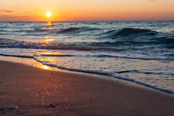 Fototapeta na wymiar Colorful sea beach sunrise. Beautiful cloudscape.