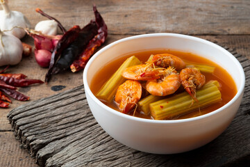Kaeng Som Puk Marum or Thai Moringa curry with shrimp has a spicy and sour soup taste.