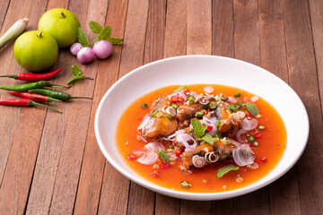 Spicy Canned Sardine Salad.Mixed salad with sliced lemon grass, fish sauce, lime juice and paprika