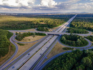 The highway intersection of the highway 5 between Frankfurt and Darmstadt in Germany at a cloudy and windy day in summer.