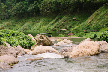 Long tail boat is popular tourists enjoy the beauty of the nature in Khun Dan Prakan Chon Dam Nakhon Nayok Thailand