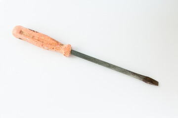old screwdriver on a white background