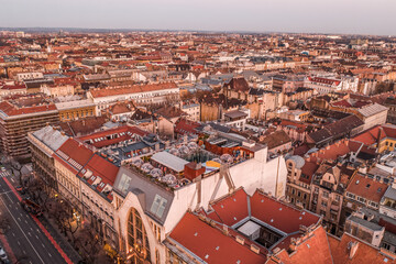 Fototapeta na wymiar Aerial drone shot of Bubble Bar terrace on rooftop of Budapest building in sunset