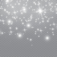 Dust white. White sparks and golden stars shine with special light. sparkles on a transparent background. Christmas abstract pattern. Sparkling magical dust particles.