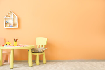 Stylish interior of modern playroom in kindergarten