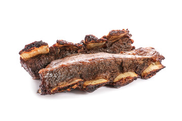 Tasty beef short ribs on white background