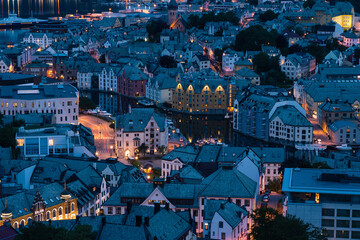 Old town of Alesund city at night in summer season, western Norway, Scandinavia