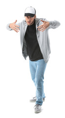 Male hip-hop dancer on white background