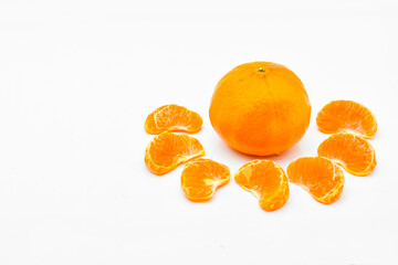 tangerine or mandarin fruit with leaves isolated on white background,