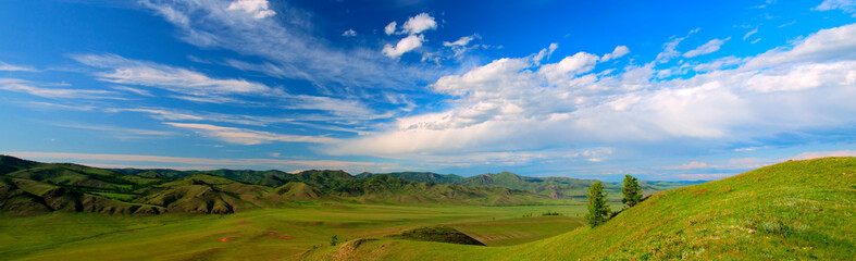 Panoramic view of the hills and mountains. Mountain-steppe landscape. South Siberia. The Republic of Khakassia.
