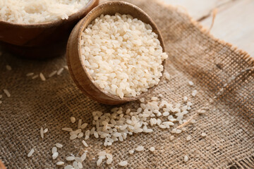 Bowl with rice on table