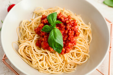 Plate with tasty pasta bolognese, closeup