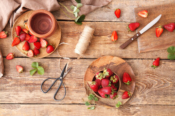 Composition with fresh ripe strawberry on wooden background