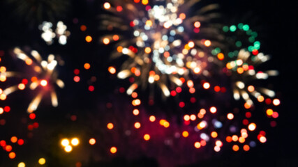 blurred multicolored flashes of fireworks