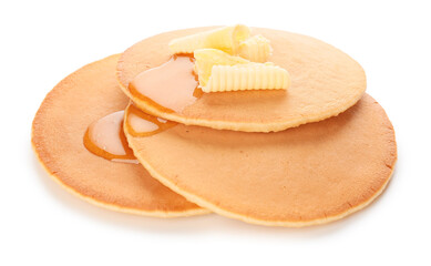 Tasty pancakes with honey and butter on white background