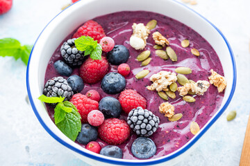 Berry Fruit Bowl with Yoghurt. Fresh and Healthy Brunch or Breakfast. Close Up View