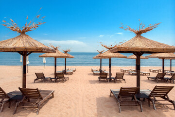 beach chairs and umbrellas on the beach