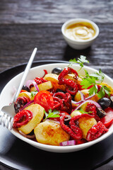 Italian braised baby octopuses with young potatoes