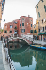 Fototapeta na wymiar Water in one of the Venice canals