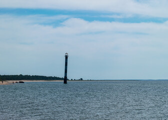 landscape with an abandoned sloping lighthouse 
