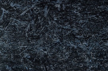 Fototapeta na wymiar Abstract dark background. Grunge dirty backdrop. Pressed wooden panel background.