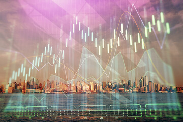 Forex chart on cityscape with skyscrapers wallpaper double exposure. Financial research concept.