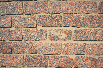 Texture of red bricks with sand