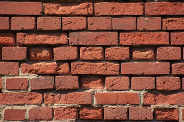 Texture of old breaking red brick