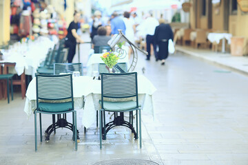 abstract blurred background street cafe in the city, no people, empty, summer restaurant quarantine